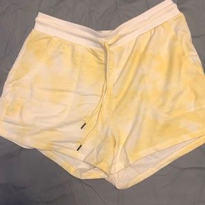 Yellow tie dye shorts